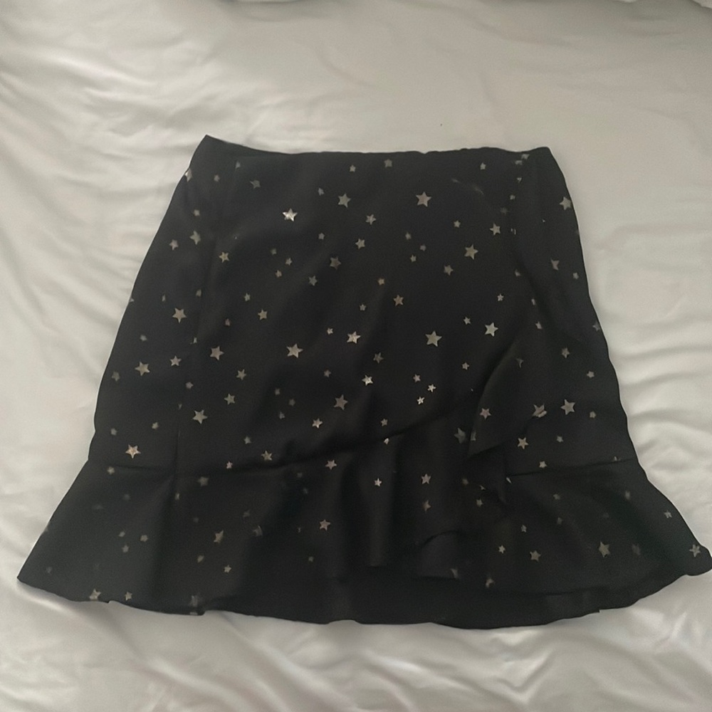 Altard State black skirt with gold stars. Size Small with working zipper.